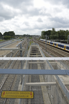 824726 Gezicht in de in aanbouw zijnde dive-under bij het spoorwegknooppunt Lunetten te Utrecht, vanaf de ...